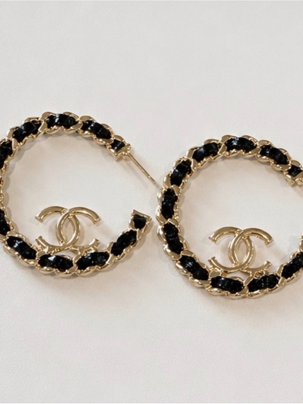 Gold-Tone Hoop Earrings with Black Accents and Interlocking Logo - Picture 3 of 3